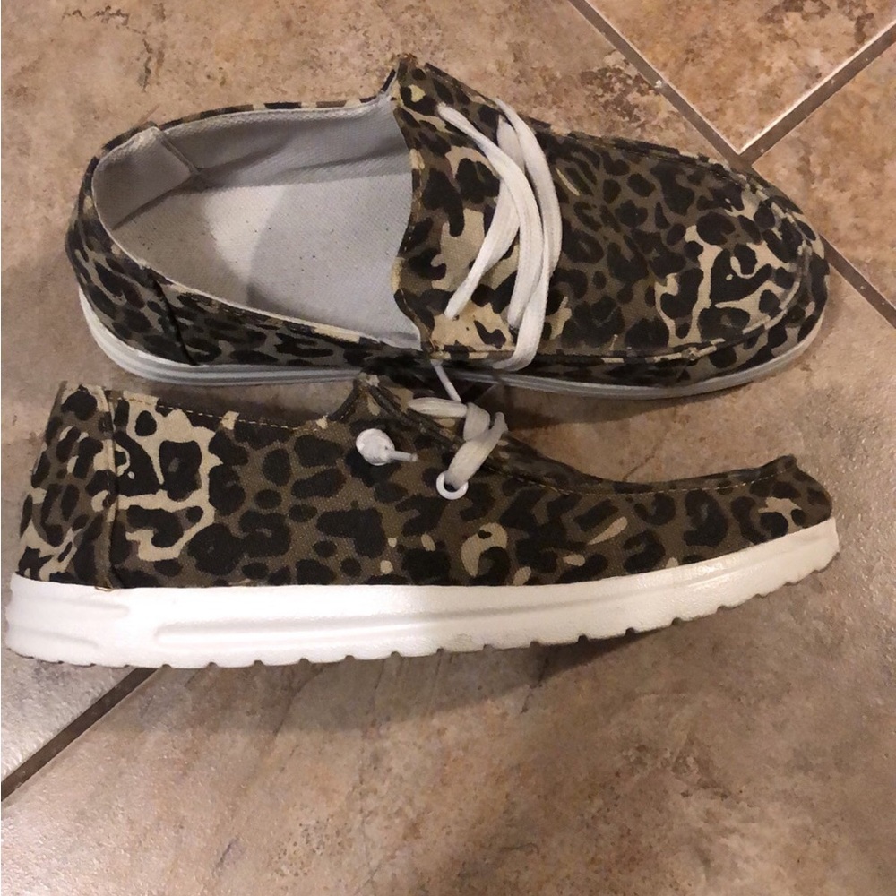 Boutique leopard print slip on shoes.